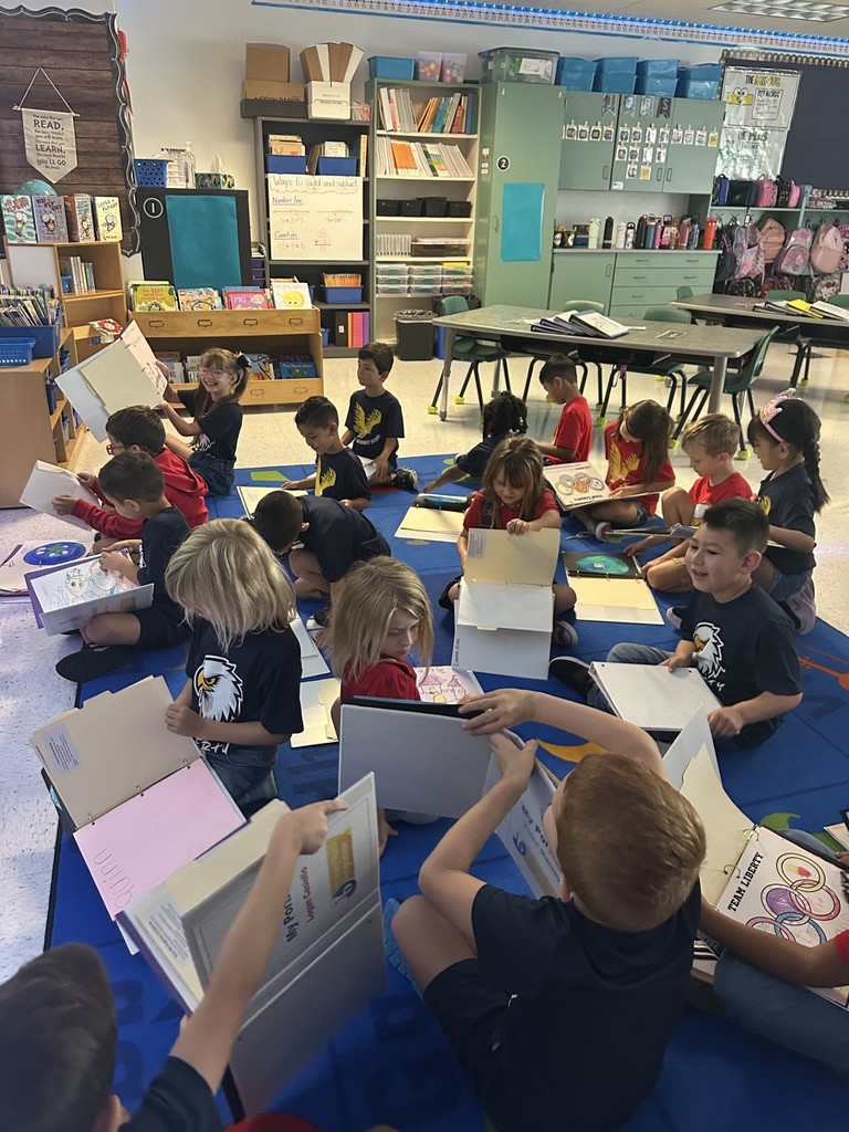 First grade looking at IB portfolios for IB portfolio exchange day!!