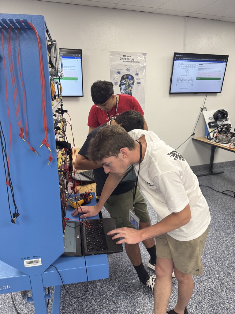 Students in new auto shop.