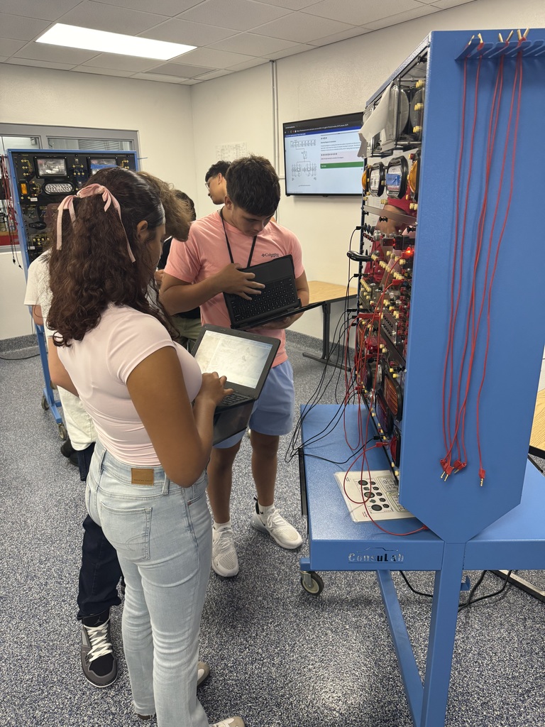 Students in new auto shop.