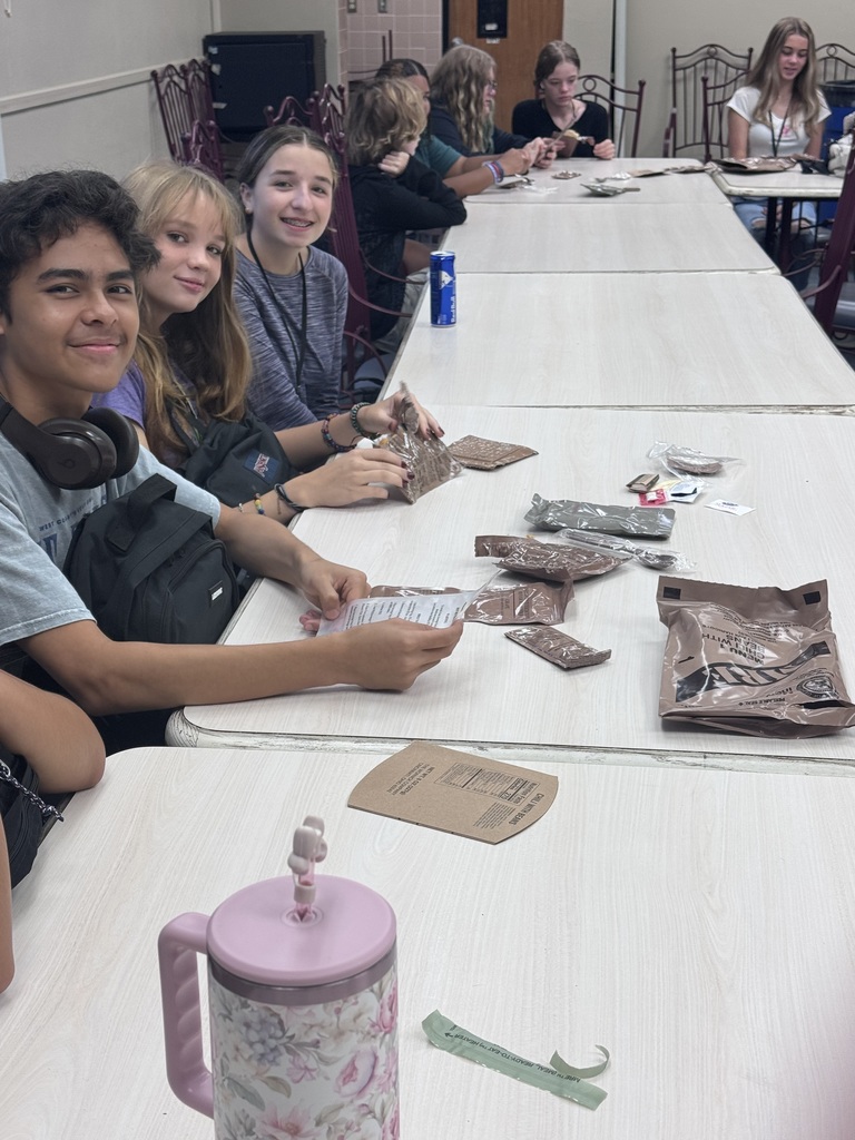 Students in culinary arts trying MREs.