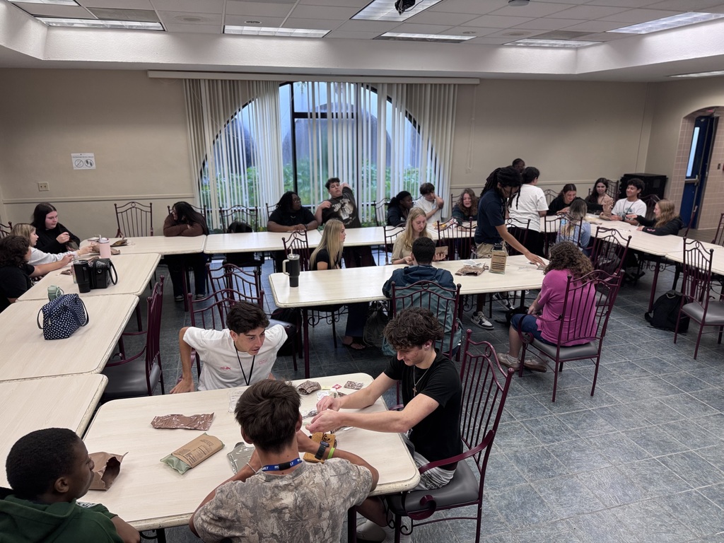 Students in culinary arts trying MREs.
