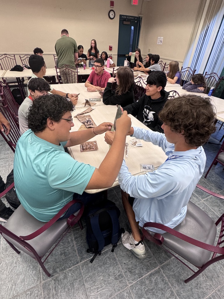 Students in culinary arts trying MREs.