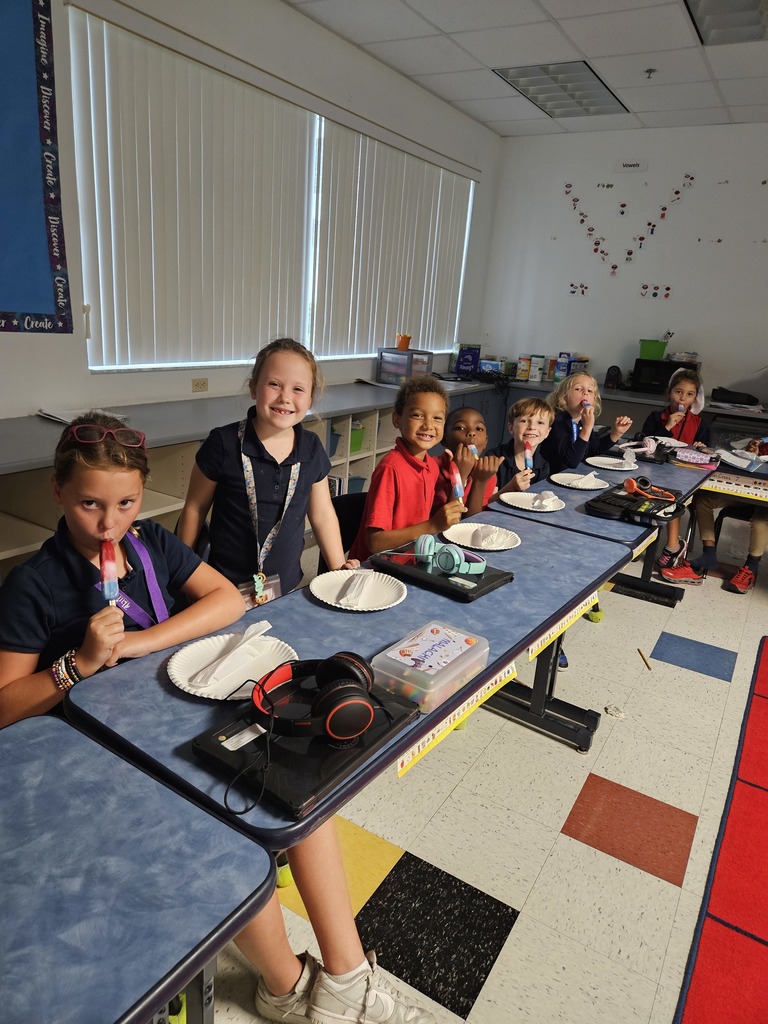 students eating popsicles
