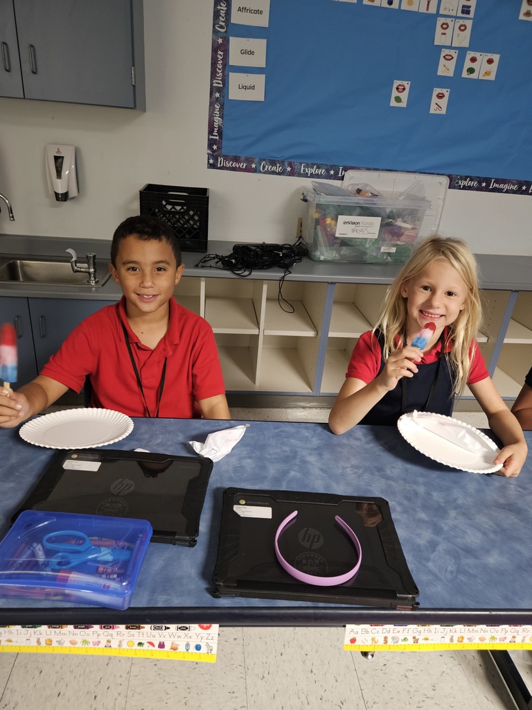 students eating popsicles