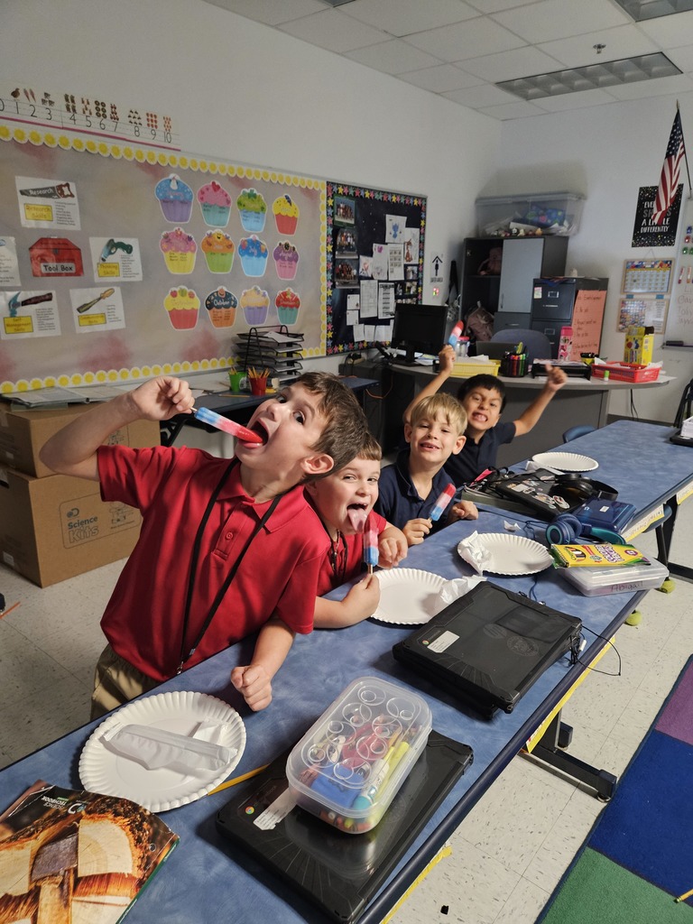 students eating popsicles