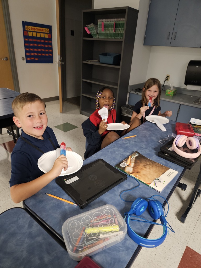 students eating popsicles