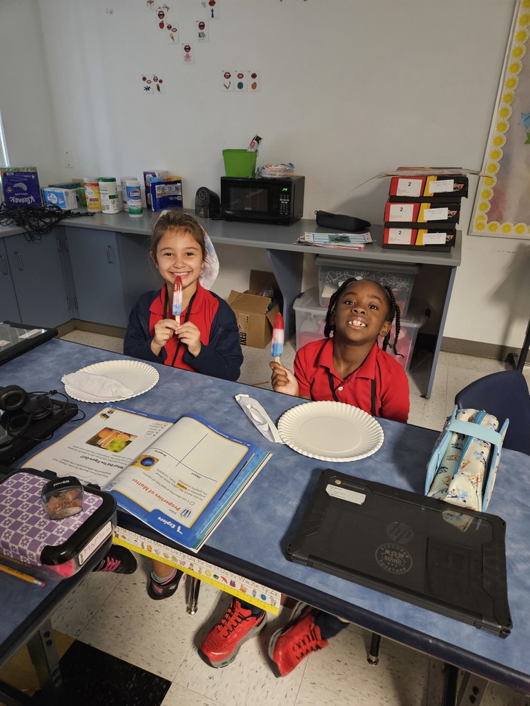 students eating popsicles