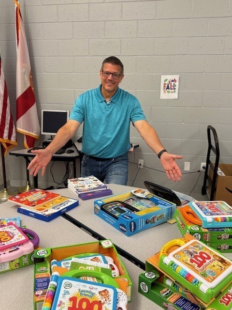 teacher with teaching materials