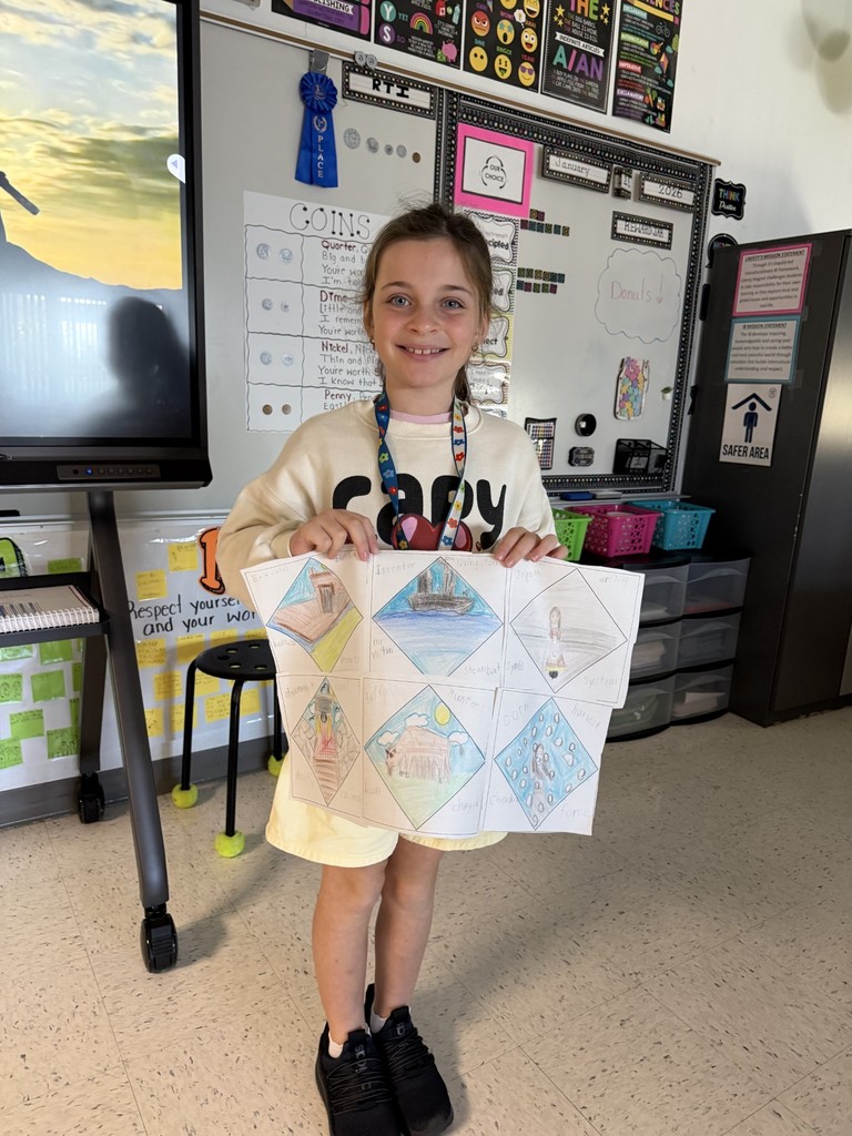 student showing project