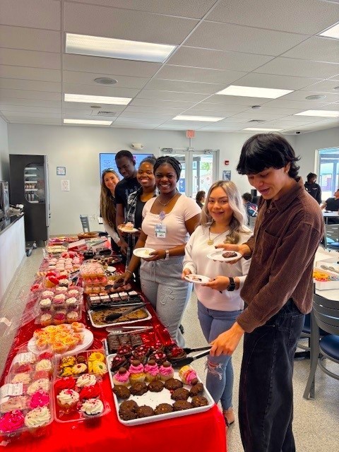 Student celebrating Valentines day with classmates.