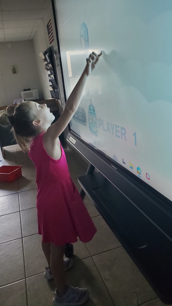 Student using the touchscreen