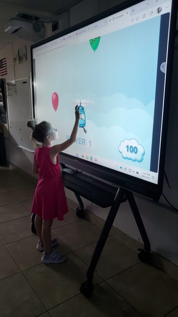 Student using the touchscreen