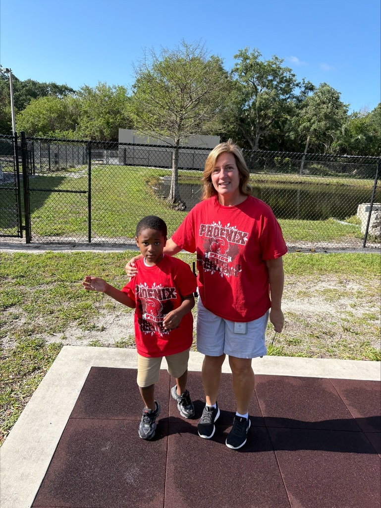 student and staff in matching outfits