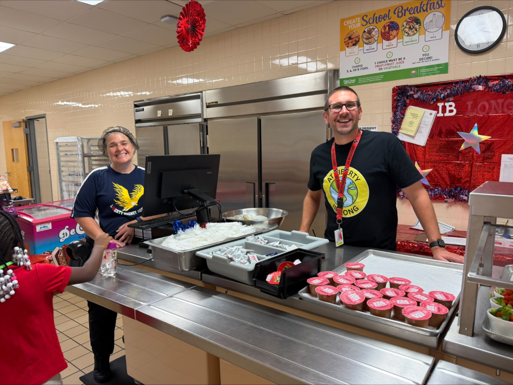 Mr. Taylor serving lunch