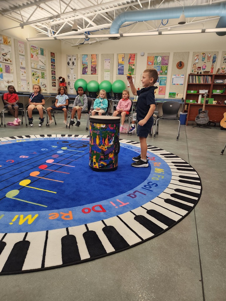 Student playing an instrument