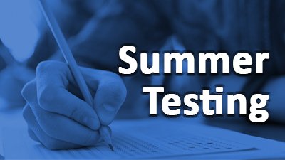 A student filling in bubbles on an answer sheet with words saying, "Summer Testing"