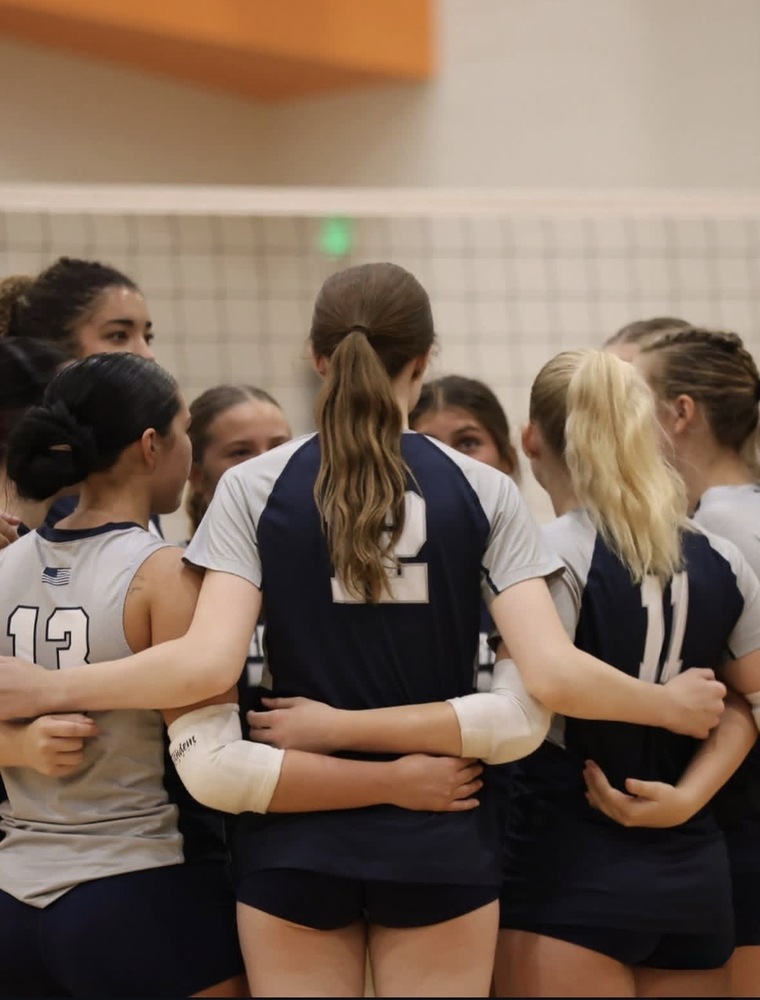 Volleyball Team Huddle at 9/4-5 Tournament