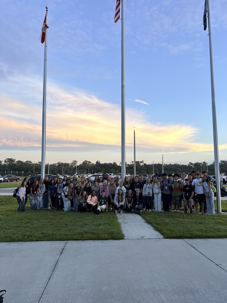 Members of Christian leadership clubs at the PCHS flagpole for their morning prayer