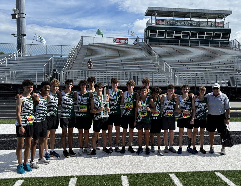 boys cross country with trophy