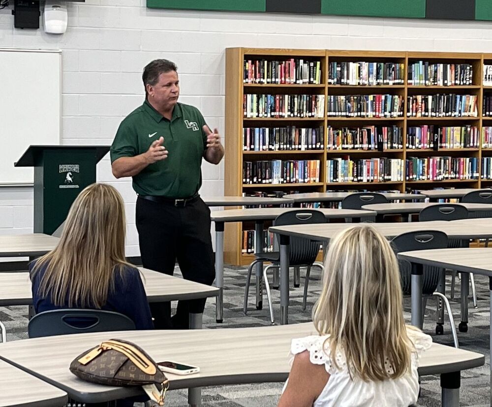 Miike Mullen addresses the community