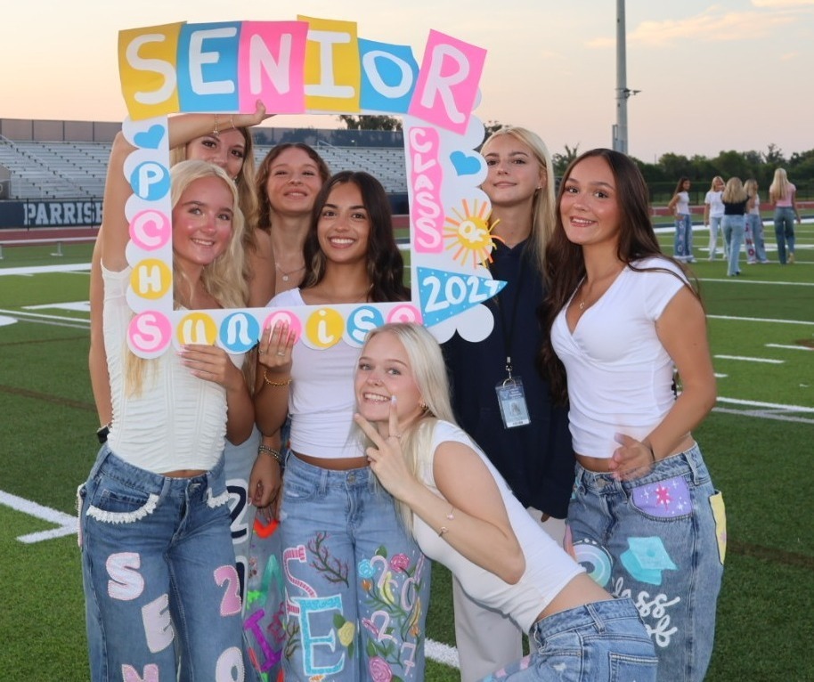 A group of seniors celebrating the start of the year at the annual senior sunrise.