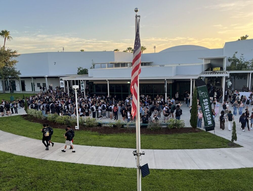 Mustangs in courtyard on day one