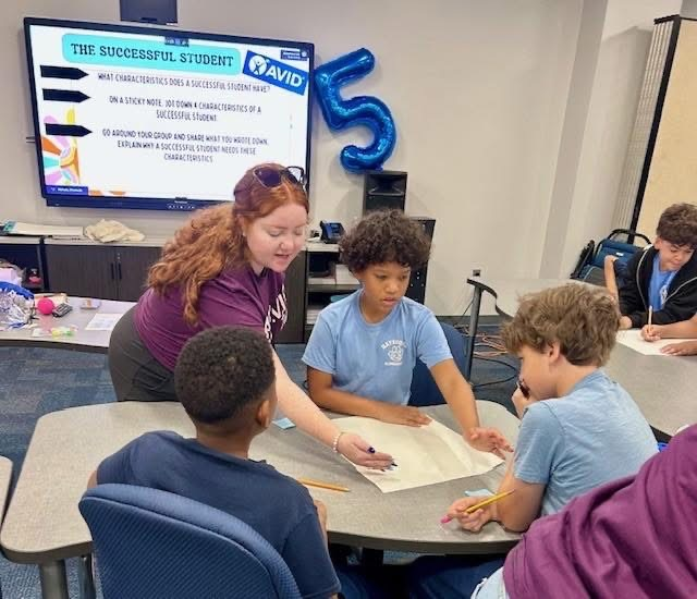 students working together on an assignment