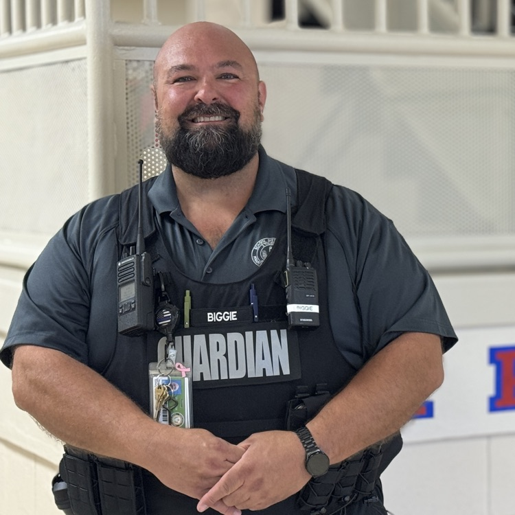 a smiling school safety guardian