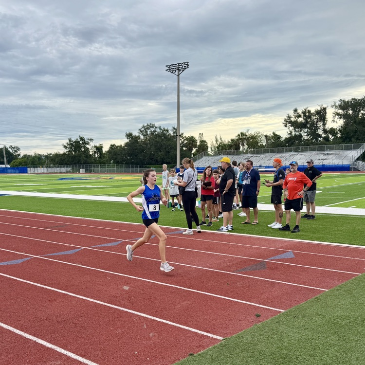 A middle school runner on the track at Bayshore high school