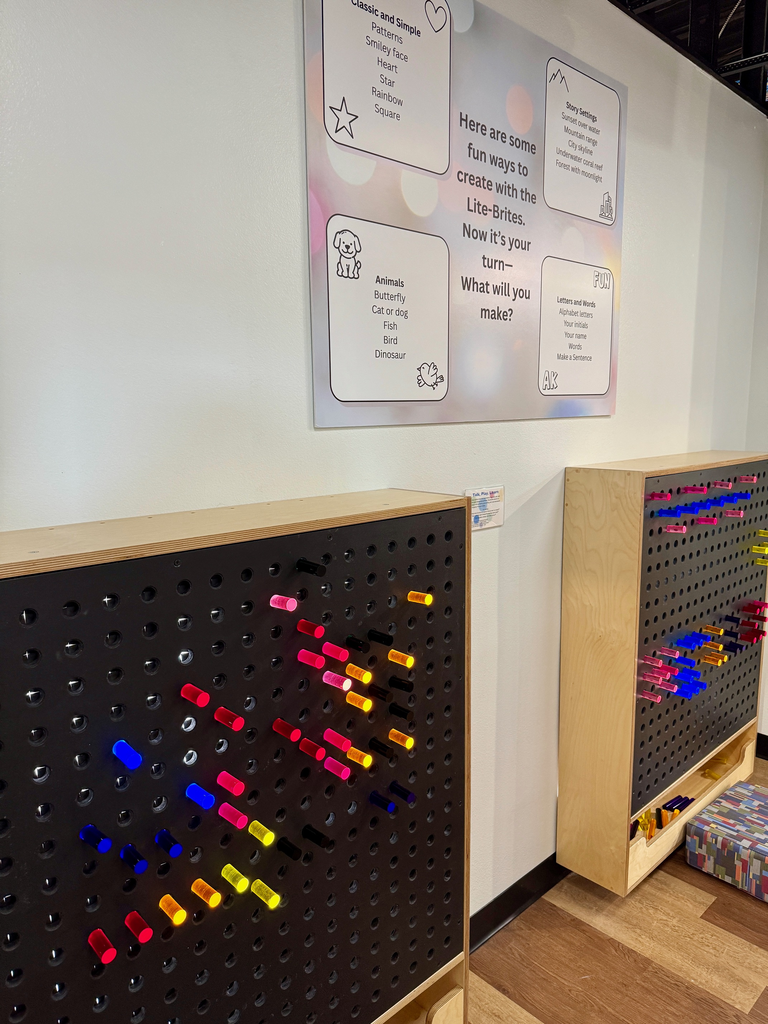 A learning area set up to look like a life-size Lite-Brite. 