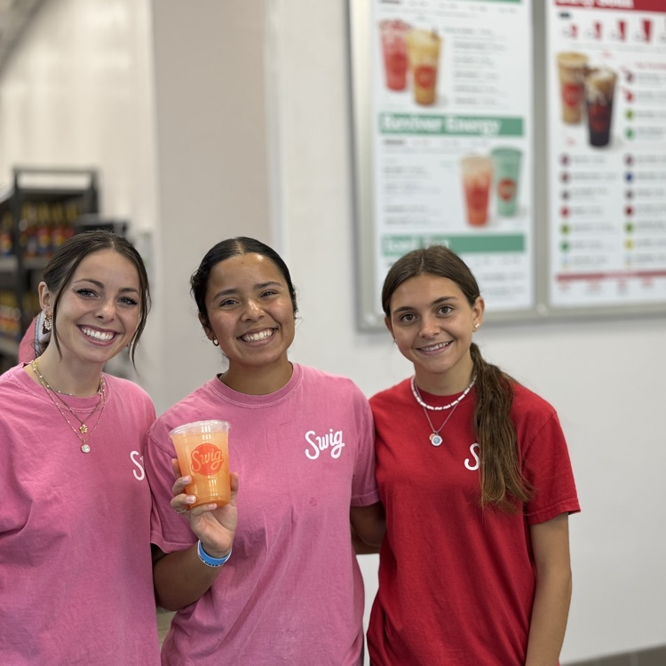 the owner and staff of Swig Cortez in their new location 