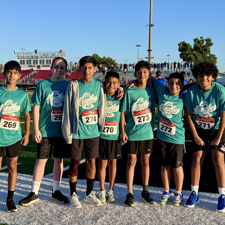 Boys runners from Johnson K-8 gather ahead of the middle school track meet