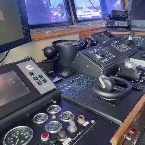 The operating panel of a research vessel with gauges and knobs