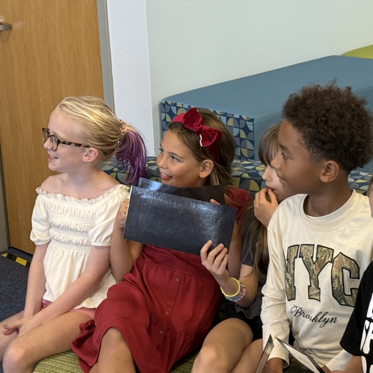 A group of students having fun in class