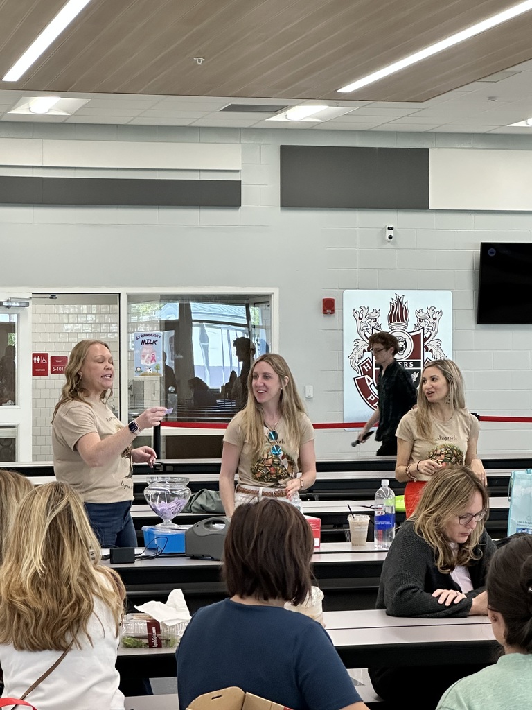 Professional development underway in a school cafeteria.