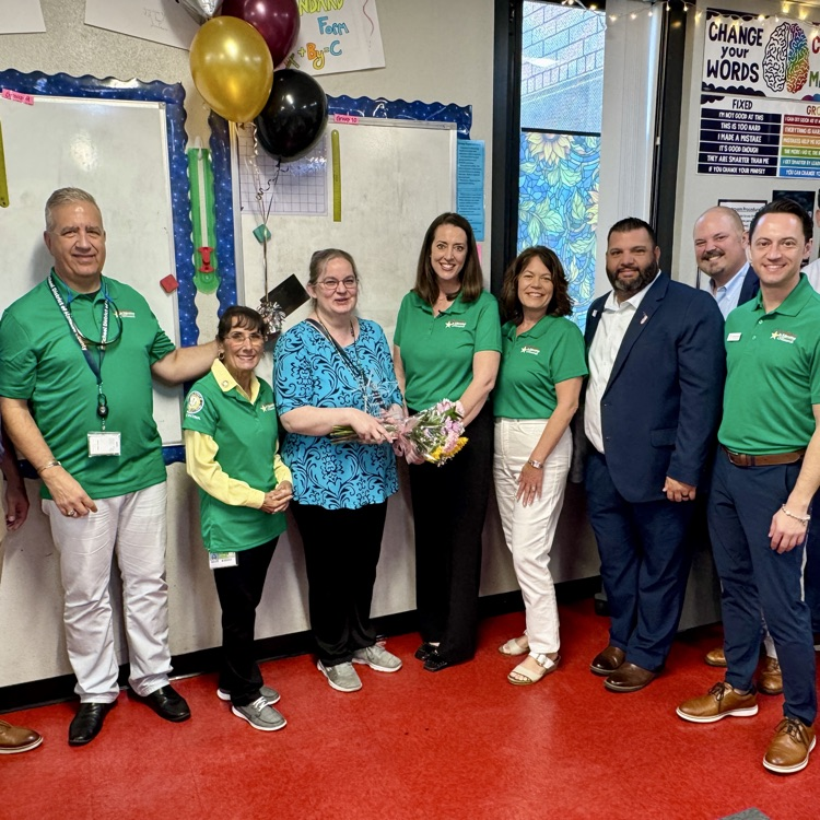 A teacher of the year finalist with district staff oh no