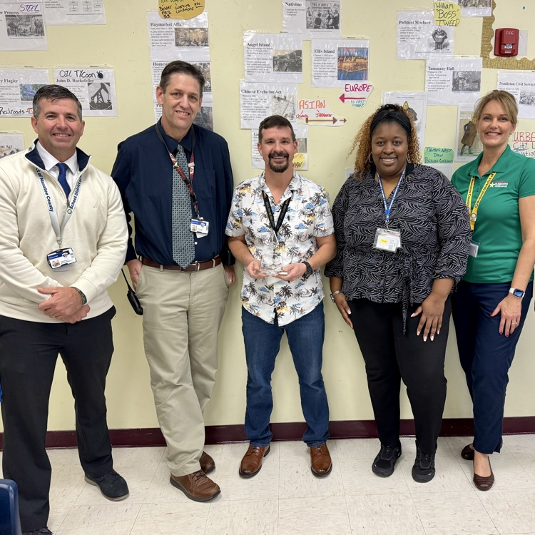 Administrators with a teacher of the year finalist