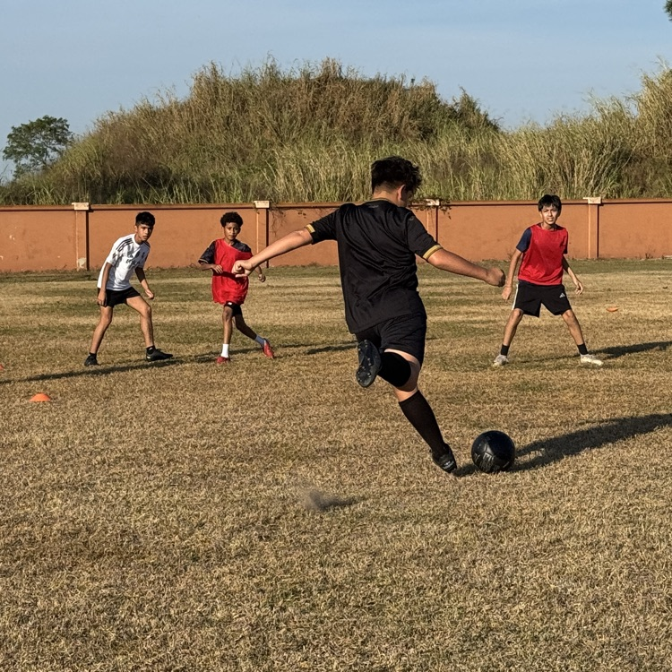 Boys playing soccer after school