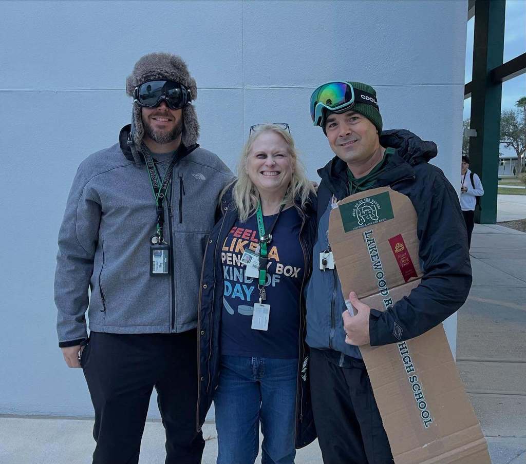 school administrators dressed for winter sports spirit day