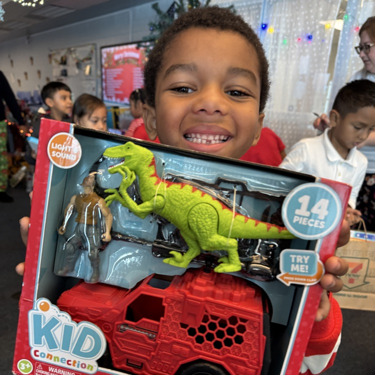 A child with their favorite toy from Santa’s workshop