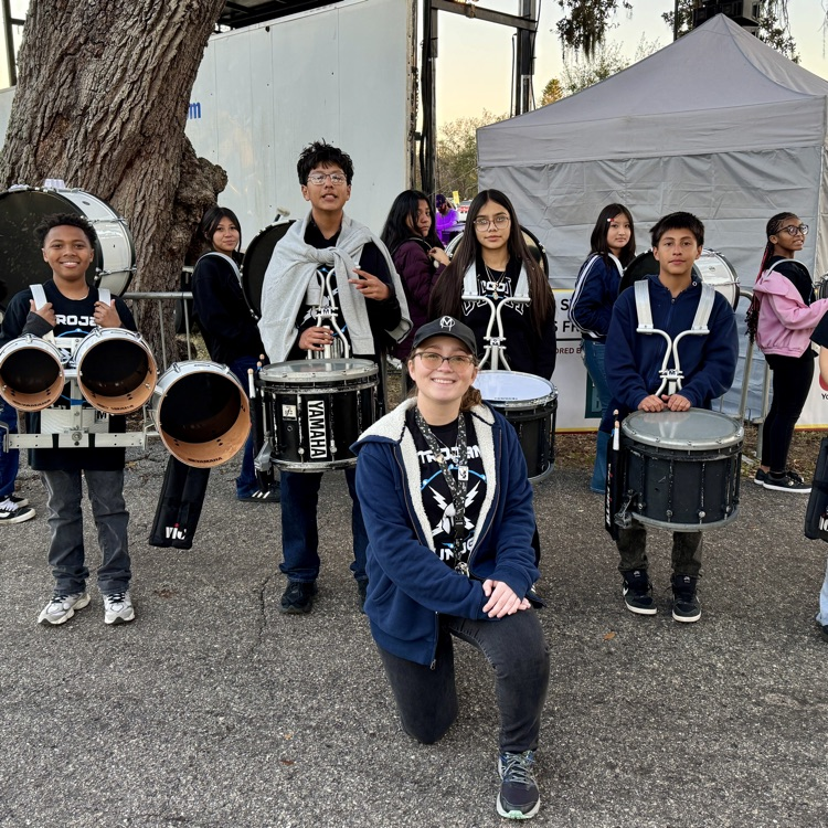 A middle school Drumline gets ready to perform at the fair