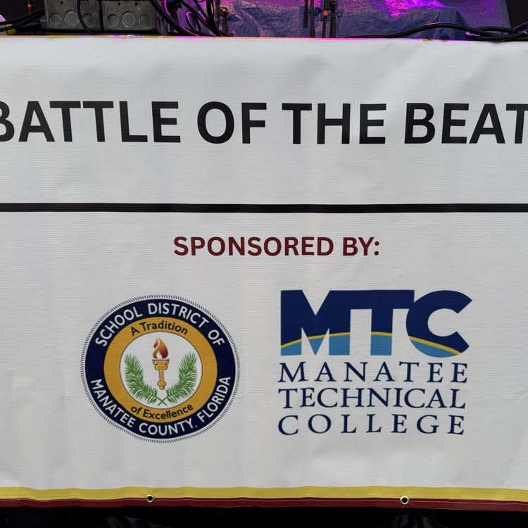 A sign that says battle of the beats with Manatee technical College as a sponsor