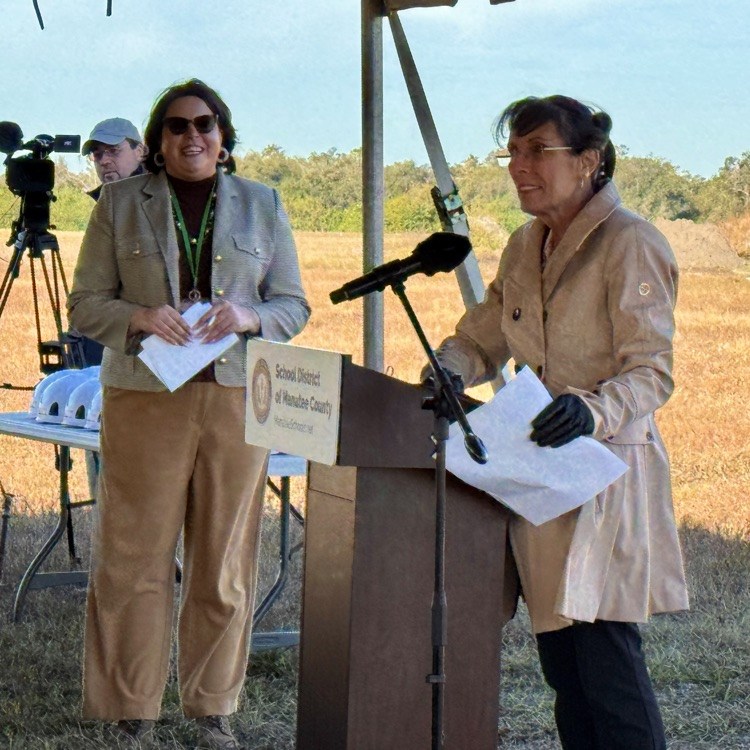 The school board Chere makes comments during a high school groundbreaking