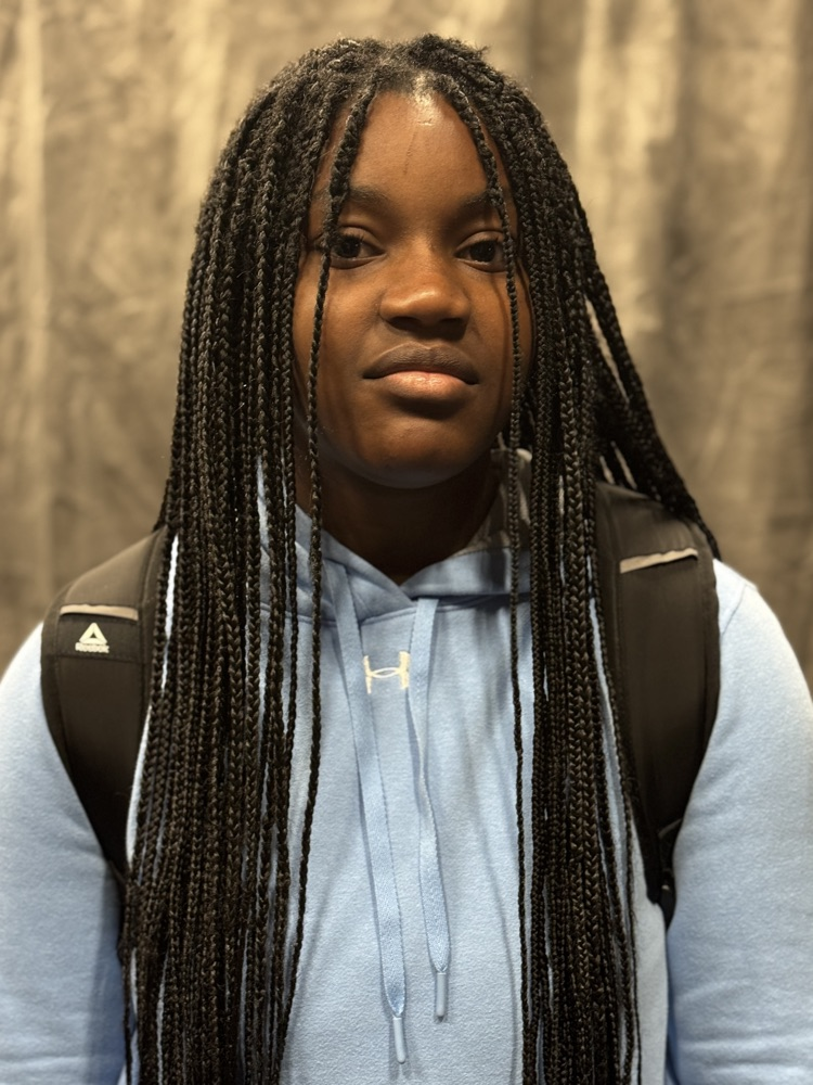 A picture of a young woman with long hair