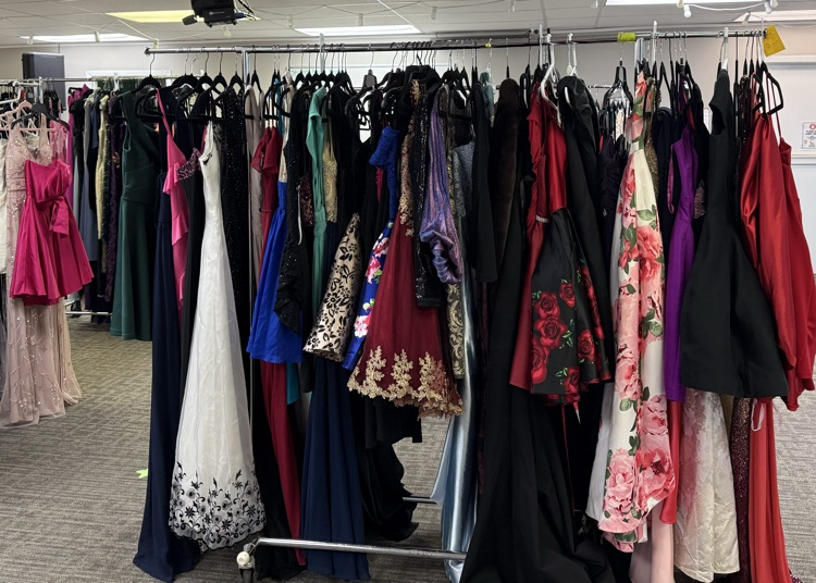 A rack of teenage prom dresses