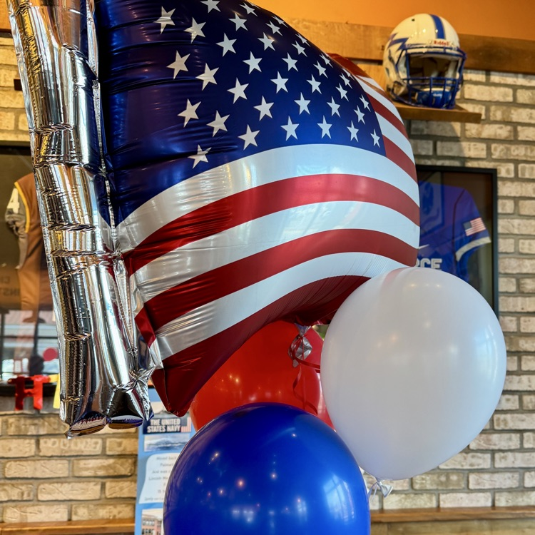 Red white and blue balloons to celebrate a veterans birthday