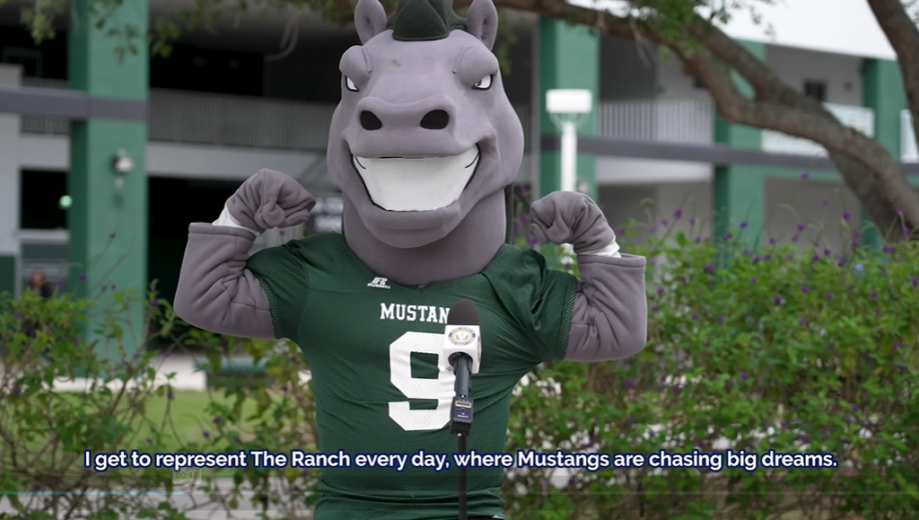 A school horse mascot flexing its muscles with the caption, "I get to represent The Ranch every day, where Mustangs are chasing big dreams."