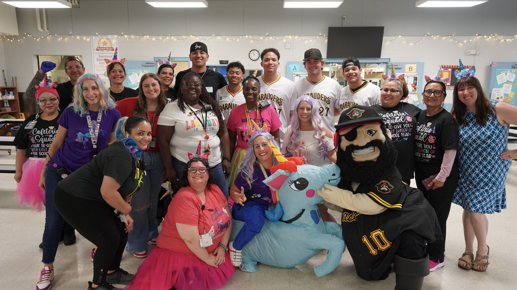 The Bradenton Marauders baseball team joins school staff for a photo on the last day of school.