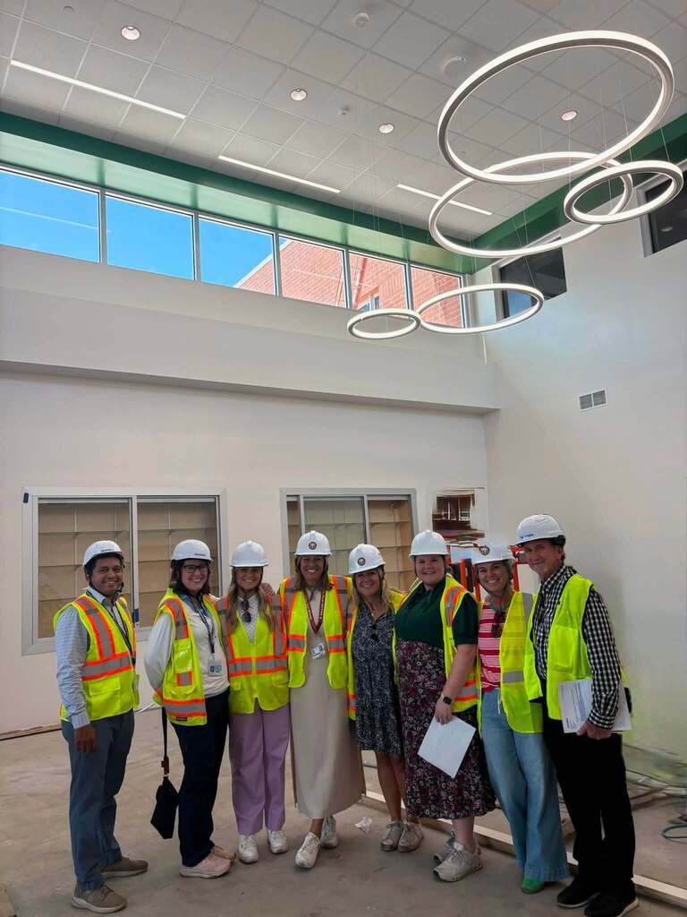 leadership team in lobby at construction site