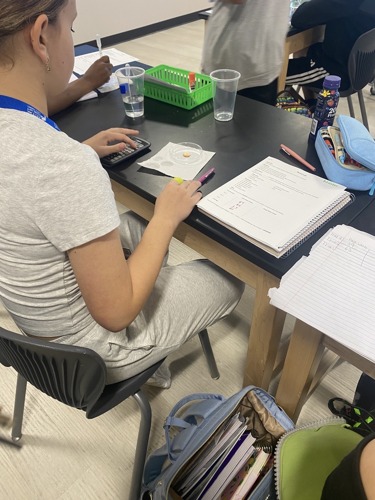 Students conducting experiments with water!